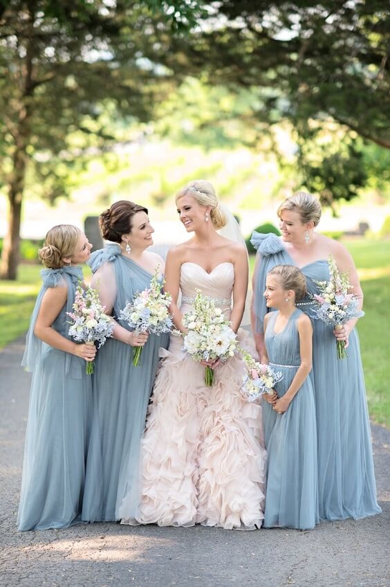 Blush Bride and dusty blue bridesmaids for Blush and dusty blue wedding